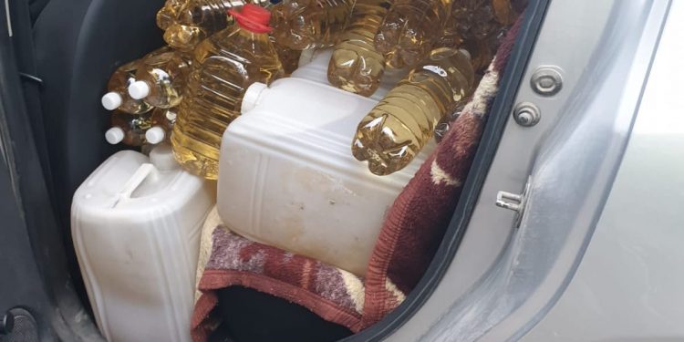 Prin cu 300 de litri de alcool în mașină